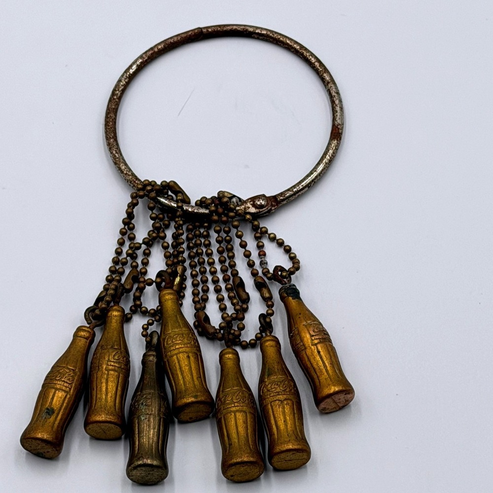 Vintage Coca-Cola Brass Tone Bottle Charm Keychain Lot of 7 Soda Advertising
